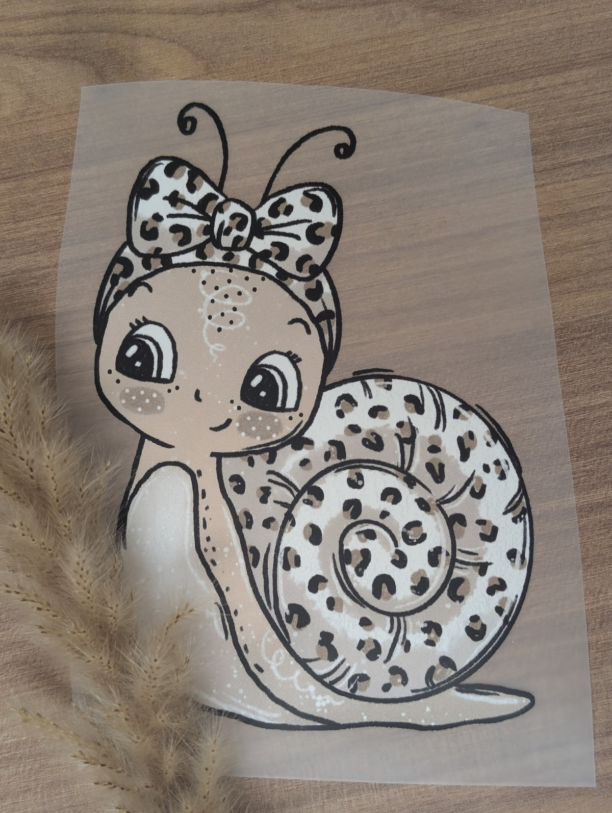 Niedliches Leo Schnecke Bügelbild für Kinderkleidung